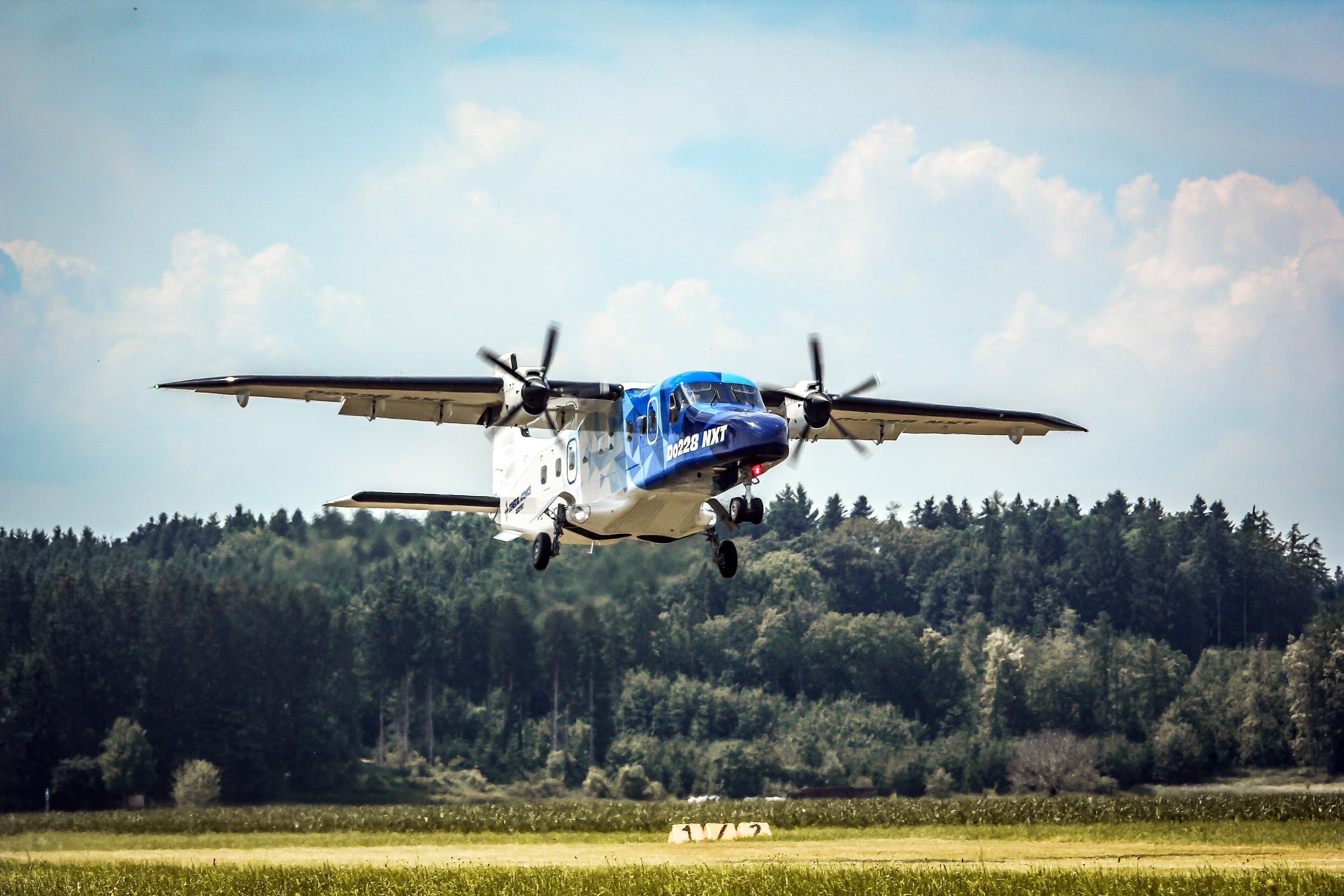 Successful grass landing by the Do228 NXT